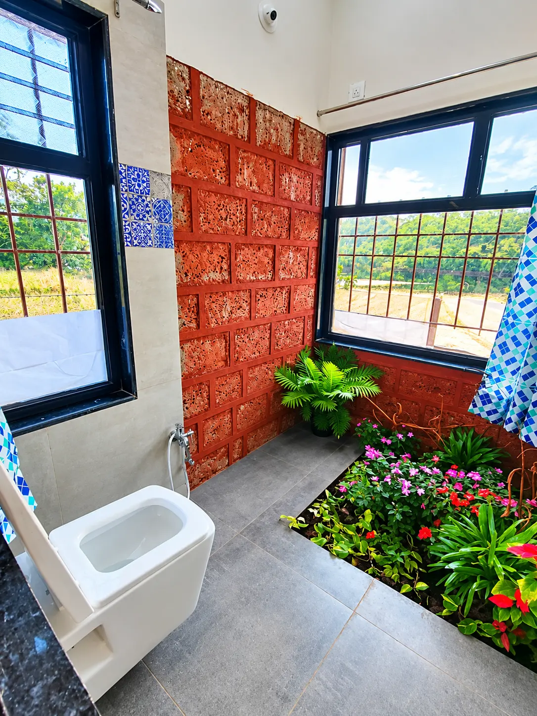 Lake view toilet at Viva Andur farmhouse rooms